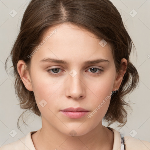 Neutral white young-adult female with medium  brown hair and brown eyes