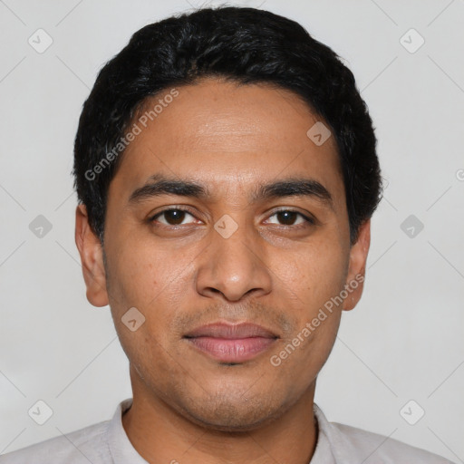 Joyful latino young-adult male with short  black hair and brown eyes