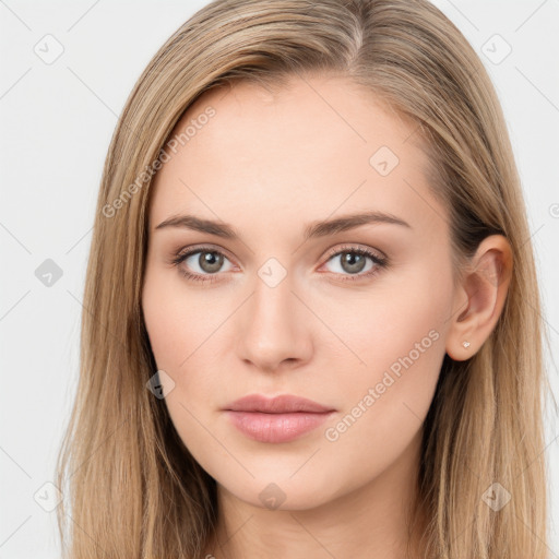 Neutral white young-adult female with long  brown hair and brown eyes