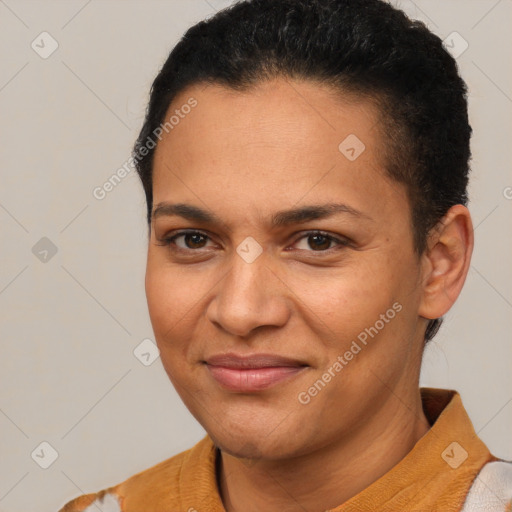 Joyful latino young-adult female with short  brown hair and brown eyes