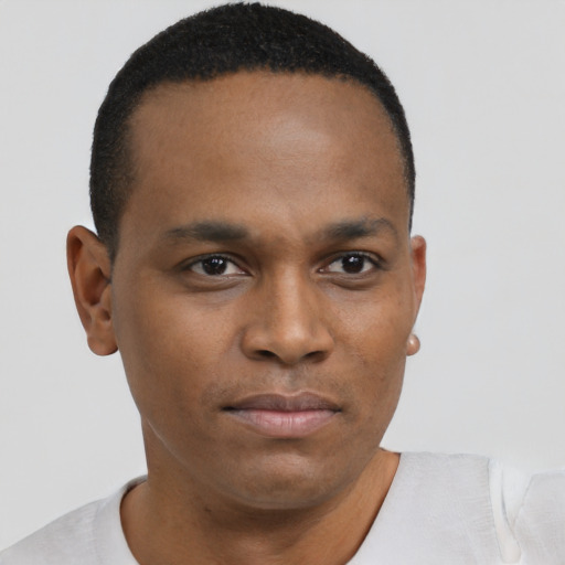 Neutral black young-adult male with short  brown hair and brown eyes