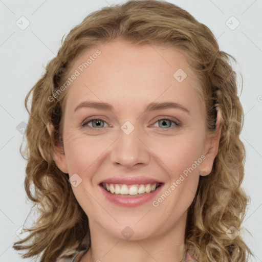 Joyful white young-adult female with long  brown hair and blue eyes