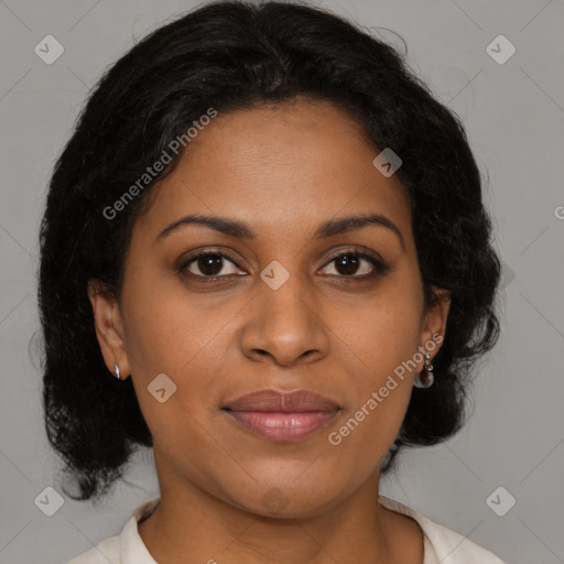 Joyful black young-adult female with medium  brown hair and brown eyes