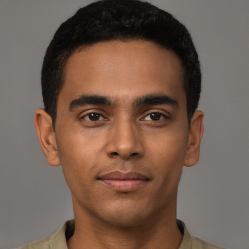 Neutral latino young-adult male with short  brown hair and brown eyes