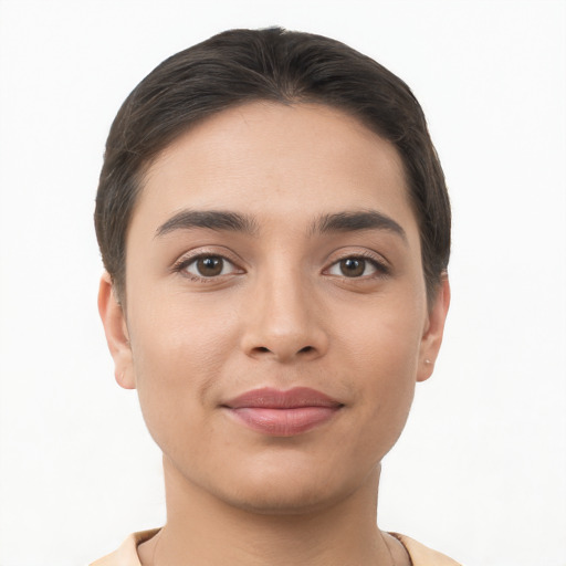 Joyful white young-adult female with short  brown hair and brown eyes