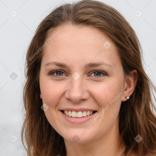 Joyful white young-adult female with long  brown hair and grey eyes