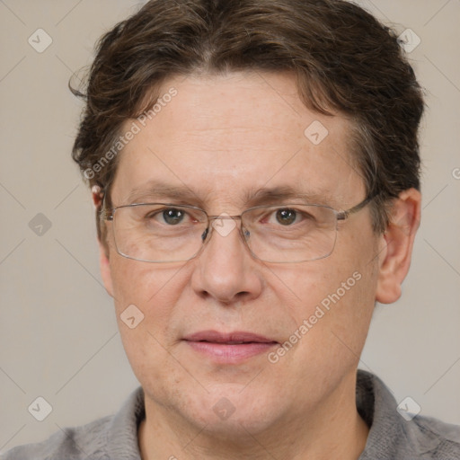 Joyful white adult male with short  brown hair and grey eyes