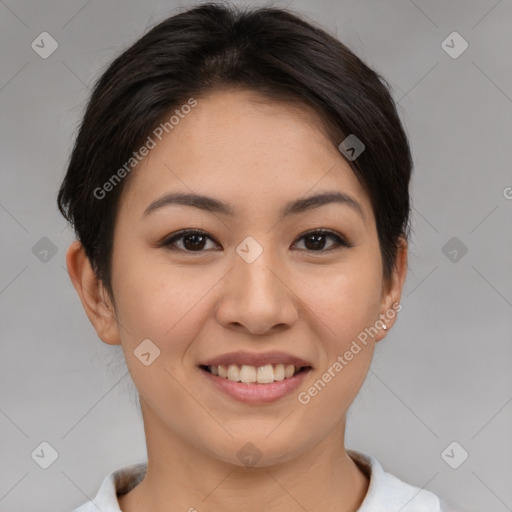 Joyful asian young-adult female with short  brown hair and brown eyes