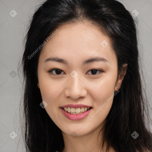 Joyful asian young-adult female with long  brown hair and brown eyes