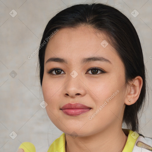 Joyful asian young-adult female with medium  brown hair and brown eyes