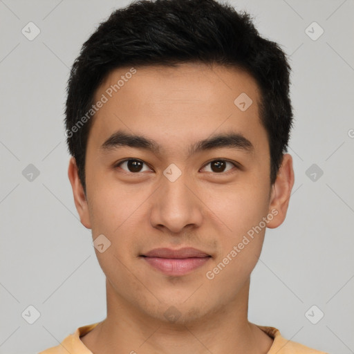 Joyful latino young-adult male with short  brown hair and brown eyes