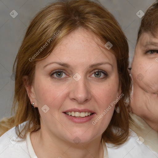 Joyful white young-adult female with medium  brown hair and blue eyes