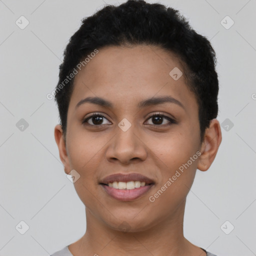 Joyful latino young-adult female with short  black hair and brown eyes