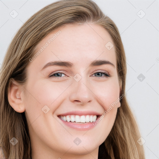 Joyful white young-adult female with long  brown hair and grey eyes