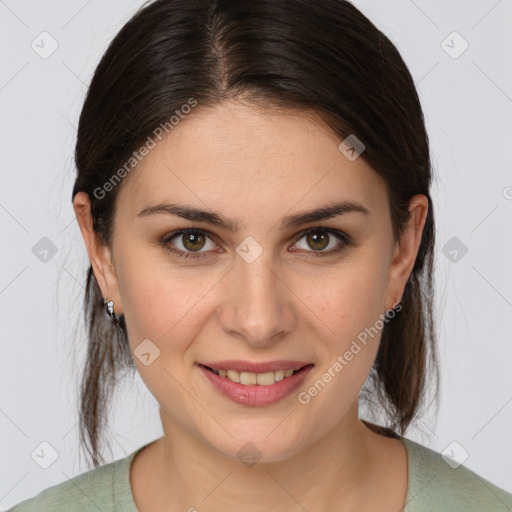 Joyful white young-adult female with medium  brown hair and brown eyes