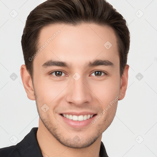 Joyful white young-adult male with short  brown hair and brown eyes