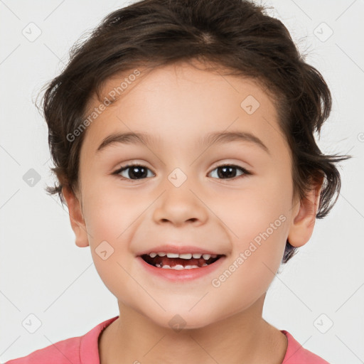 Joyful white child female with short  brown hair and brown eyes