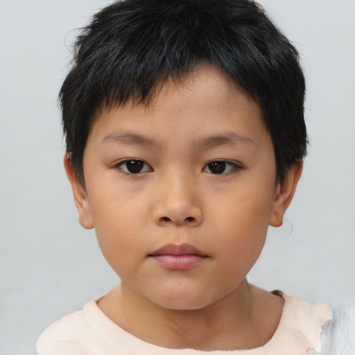 Neutral asian child male with short  brown hair and brown eyes
