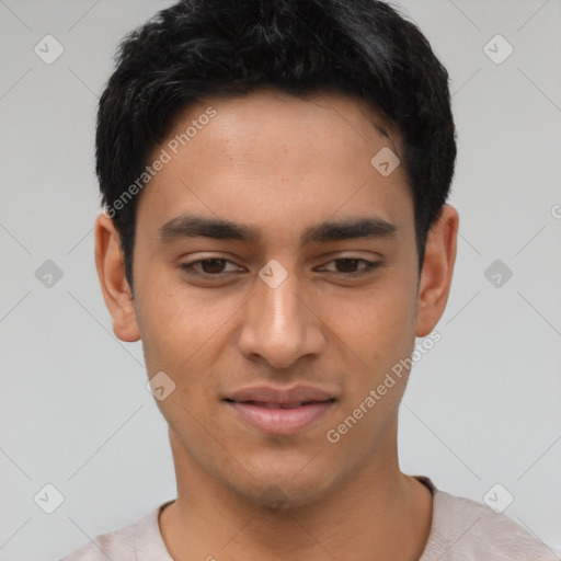 Joyful latino young-adult male with short  black hair and brown eyes