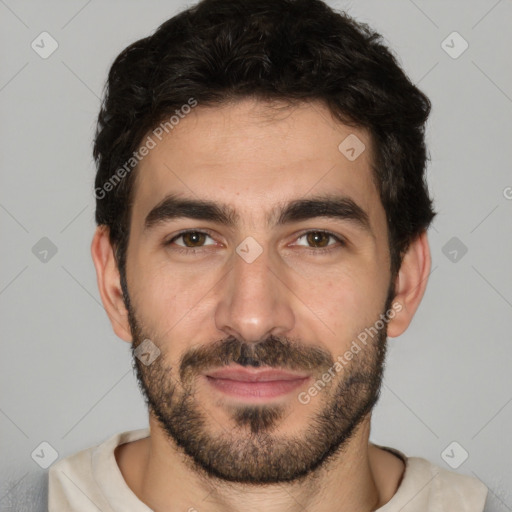 Joyful white young-adult male with short  black hair and brown eyes