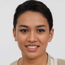 Joyful asian young-adult female with short  black hair and brown eyes