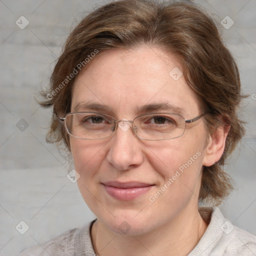 Joyful white adult female with medium  brown hair and blue eyes