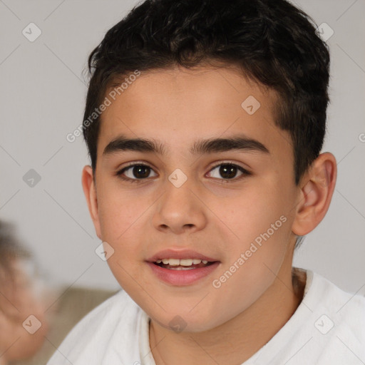 Joyful white child male with short  brown hair and brown eyes