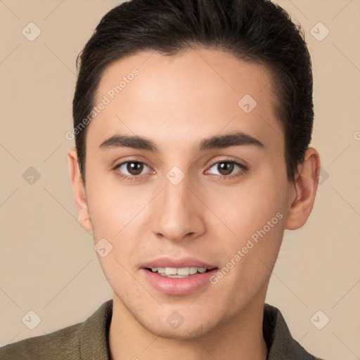 Joyful white young-adult male with short  brown hair and brown eyes