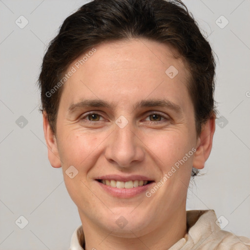 Joyful white adult female with short  brown hair and brown eyes