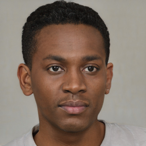 Neutral black young-adult male with short  brown hair and brown eyes