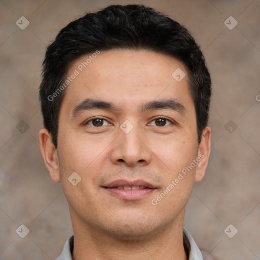 Joyful asian young-adult male with short  black hair and brown eyes