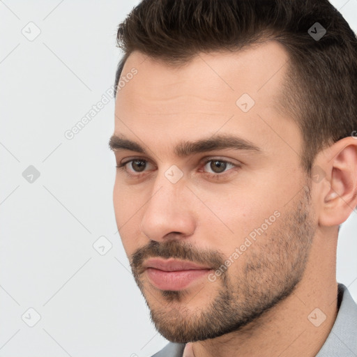 Neutral white young-adult male with short  brown hair and brown eyes