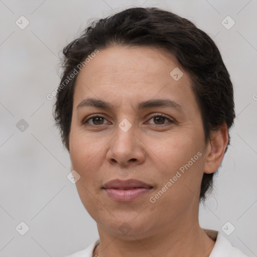 Joyful white adult female with short  brown hair and brown eyes