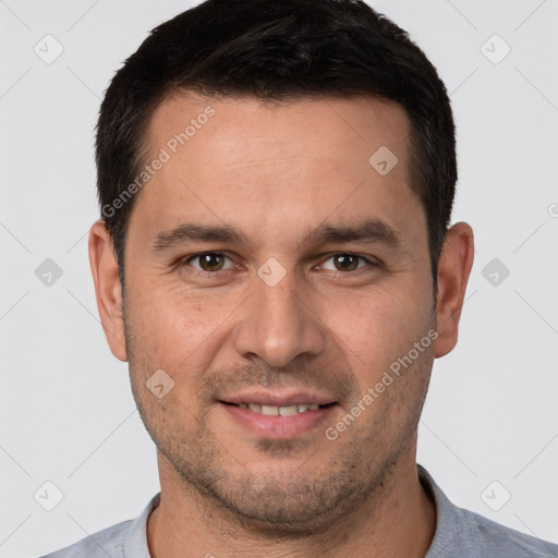 Joyful white young-adult male with short  brown hair and brown eyes