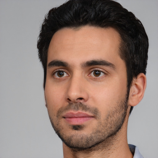 Neutral white young-adult male with short  black hair and brown eyes