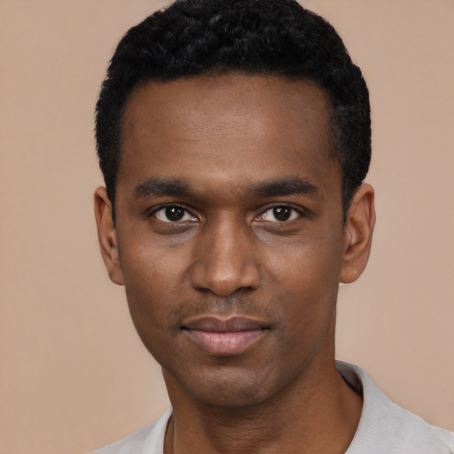 Neutral black young-adult male with short  black hair and brown eyes
