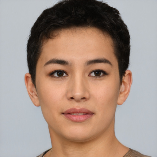 Joyful asian young-adult female with short  black hair and brown eyes