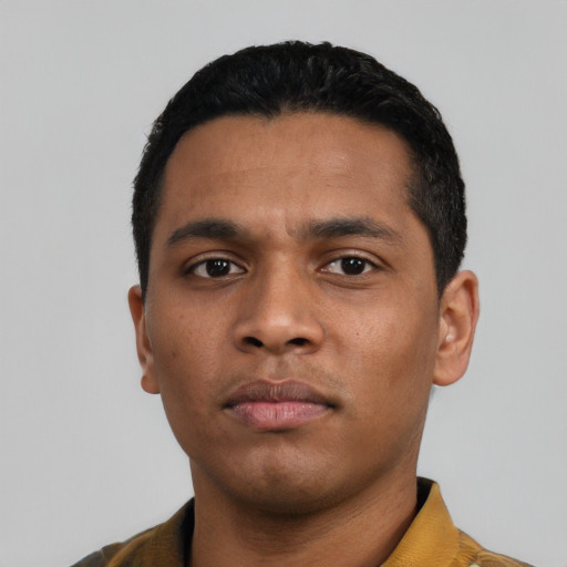 Neutral latino young-adult male with short  black hair and brown eyes