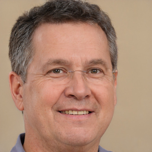 Joyful white middle-aged male with short  brown hair and brown eyes