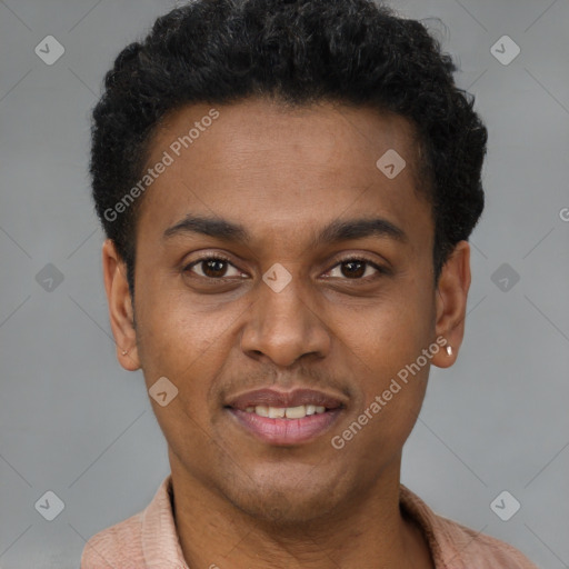 Joyful latino young-adult male with short  brown hair and brown eyes