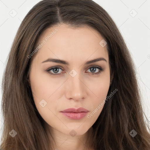 Neutral white young-adult female with long  brown hair and brown eyes