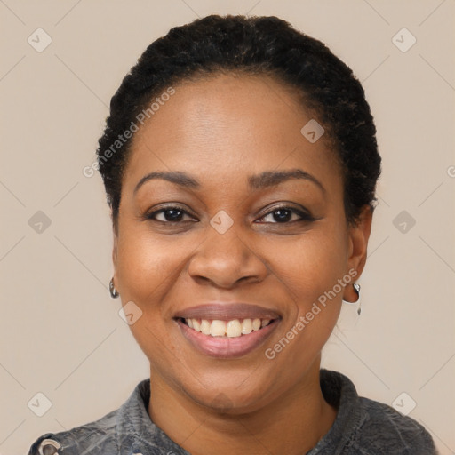 Joyful latino young-adult female with short  black hair and brown eyes