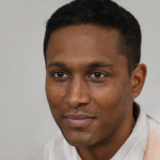 Neutral black young-adult male with short  black hair and brown eyes
