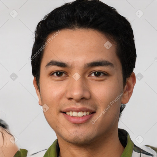 Joyful white young-adult male with short  black hair and brown eyes