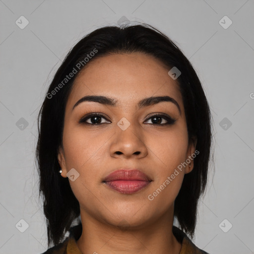 Joyful latino young-adult female with medium  black hair and brown eyes