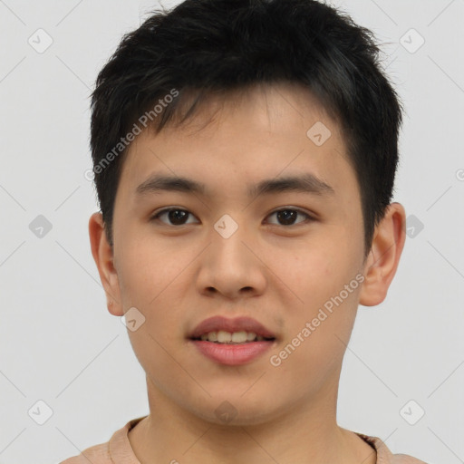 Joyful asian young-adult male with short  brown hair and brown eyes