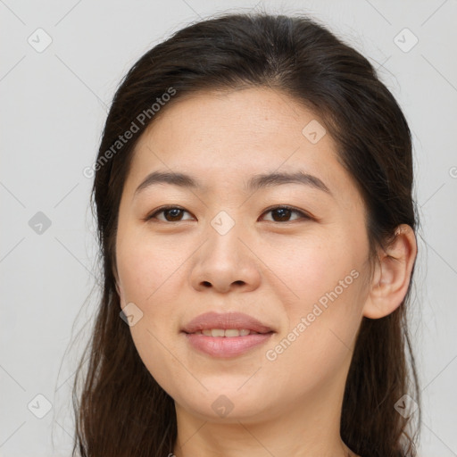 Joyful white young-adult female with long  brown hair and brown eyes