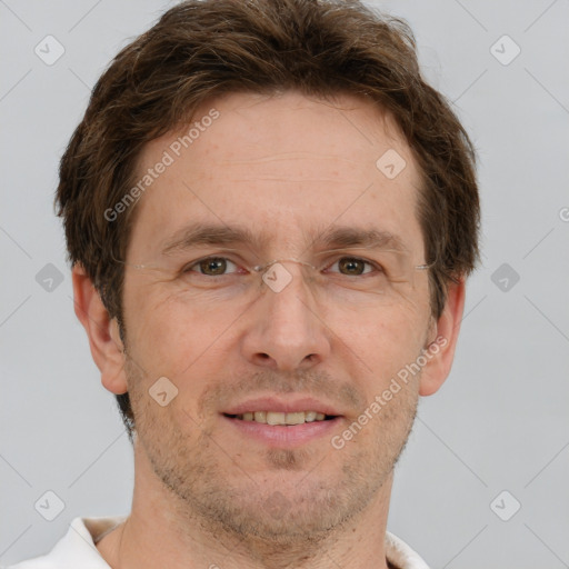 Joyful white adult male with short  brown hair and grey eyes