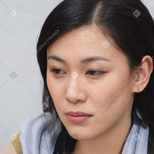 Neutral asian young-adult female with medium  brown hair and brown eyes