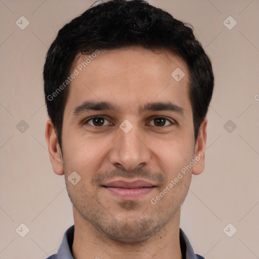 Joyful white young-adult male with short  black hair and brown eyes